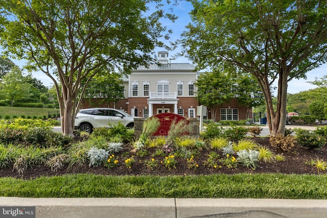 4102 Chariot Way, Upper Marlboro, MD 20772 - view of front of home with brick siding, metal roof, and a standing seam roof