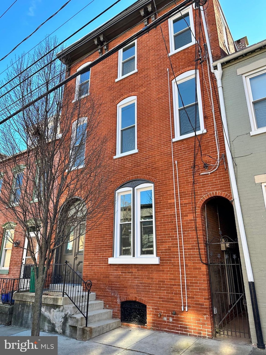 view of front of home with brick siding