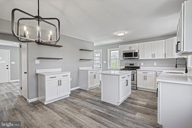 35 Herrs Ridge Rd, Gettysburg, PA 17325 - kitchen featuring white cabinets, dark wood-style flooring, open shelves, appliances with stainless steel finishes, and a sink
