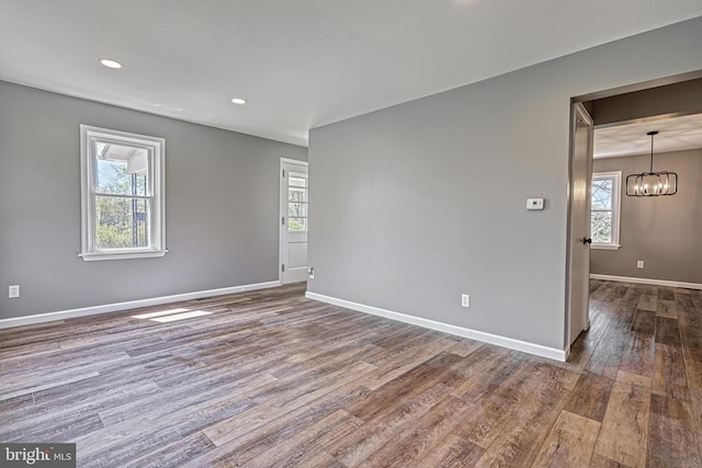 35 Herrs Ridge Rd, Gettysburg, PA 17325 - empty room featuring baseboards, recessed lighting, wood finished floors, and a chandelier