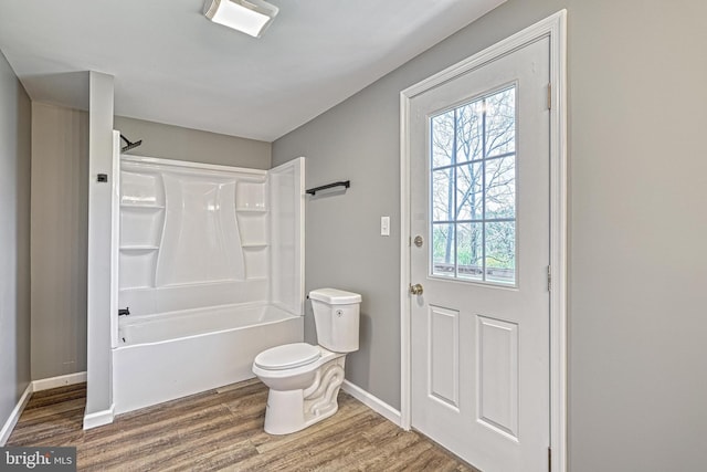 35 Herrs Ridge Rd, Gettysburg, PA 17325 - full bathroom with toilet, baseboards,  shower combination, and wood finished floors