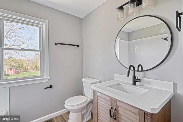 35 Herrs Ridge Rd, Gettysburg, PA 17325 - half bath featuring vanity, baseboards, wood finished floors, and toilet