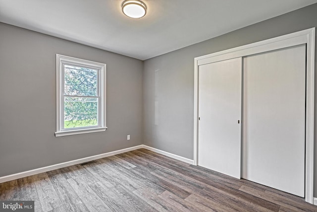 35 Herrs Ridge Rd, Gettysburg, PA 17325 - unfurnished bedroom featuring baseboards, wood finished floors, and a closet