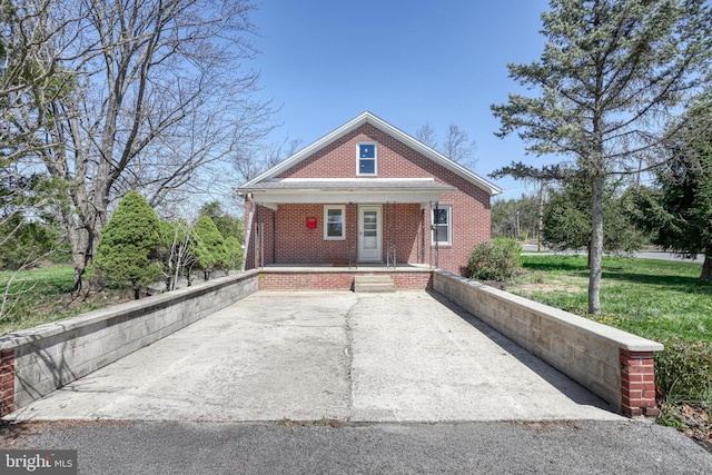 35 Herrs Ridge Rd, Gettysburg, PA 17325 - view of front of house featuring a porch and brick siding