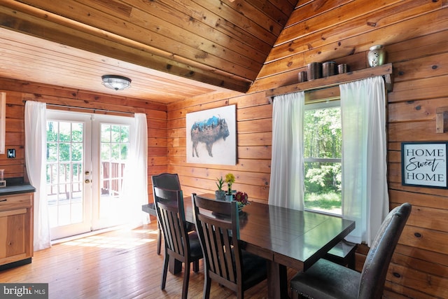 2 Heights Ct, Ruther Glen, VA 22546 - dining area with french doors, wooden walls, wooden ceiling, and light wood-type flooring