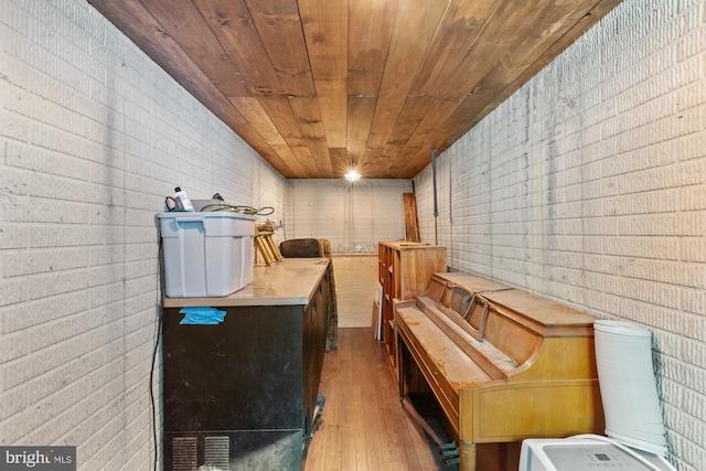 2 Heights Ct, Ruther Glen, VA 22546 - relaxing sauna featuring hardwood / wood-style flooring, wooden ceiling, and brick wall