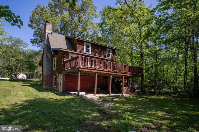 2 Heights Ct, Ruther Glen, VA 22546 - back of house with a wooden deck, a yard, and a chimney