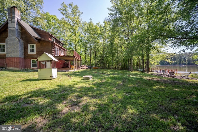 2 Heights Ct, Ruther Glen, VA 22546 - view of green lawn with a deck with water view and stairs