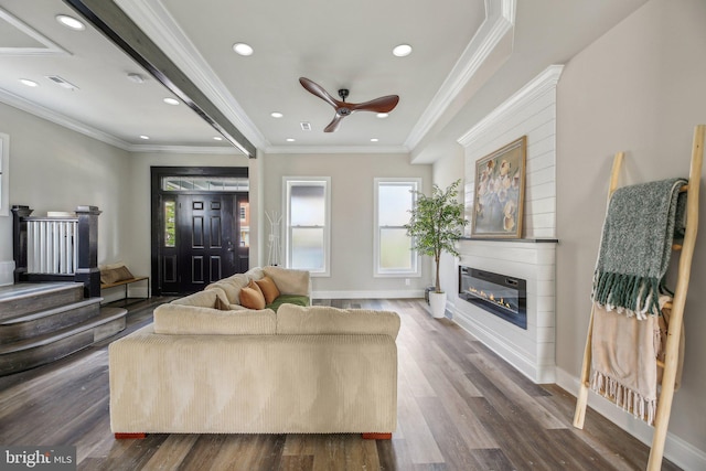 2817 Ulman Ave, Baltimore, MD 21215 - living room with dark wood-style floors, a glass covered fireplace, a ceiling fan, recessed lighting, and baseboards