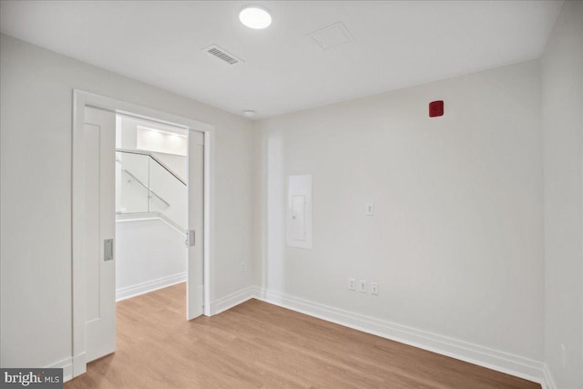 923 V St NW Unit 602, Washington, DC 20001 - spare room with light wood-type flooring and electric panel