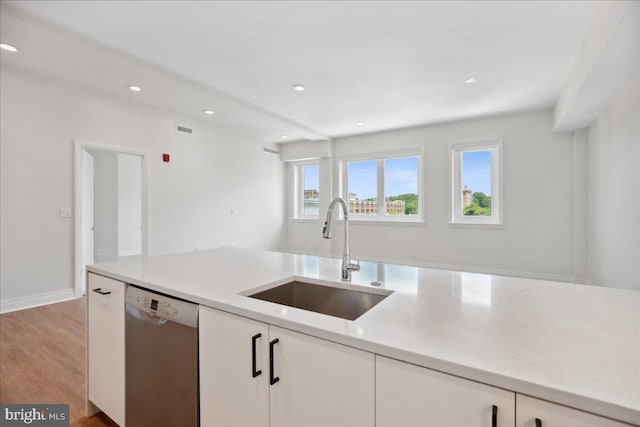 923 V St NW Unit 602, Washington, DC 20001 - kitchen featuring dishwasher, white cabinetry, light countertops, recessed lighting, and light wood-type flooring