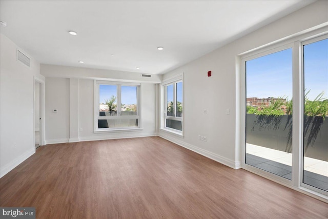 923 V St NW Unit 602, Washington, DC 20001 - unfurnished living room with wood finished floors and recessed lighting