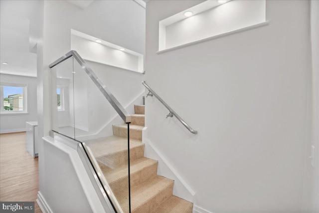 923 V St NW Unit 602, Washington, DC 20001 - stairs featuring baseboards and wood finished floors