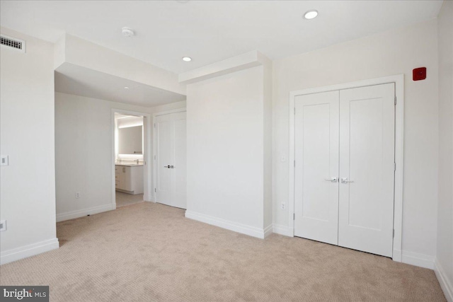 923 V St NW Unit 602, Washington, DC 20001 - unfurnished bedroom featuring carpet, recessed lighting, and ensuite bathroom