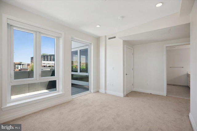 923 V St NW Unit 602, Washington, DC 20001 - unfurnished bedroom featuring access to outside, carpet, and recessed lighting