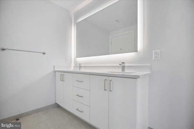 923 V St NW Unit 602, Washington, DC 20001 - bathroom featuring double vanity and baseboards