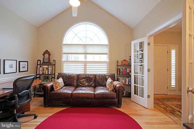 102 Morgan Way, Milton, DE 19968 - living room with french doors, light wood-style flooring, lofted ceiling, ceiling fan, and a desk