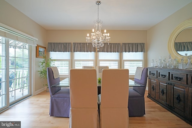 102 Morgan Way, Milton, DE 19968 - dining room featuring healthy amount of natural light, a chandelier, and light wood-style floors