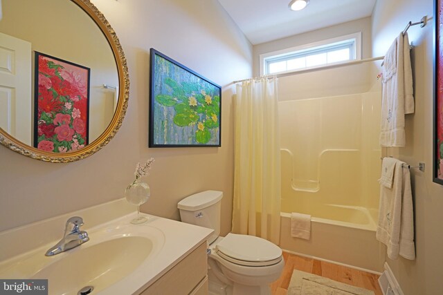 102 Morgan Way, Milton, DE 19968 - full bathroom featuring shower / tub combo, vanity, toilet, and wood finished floors