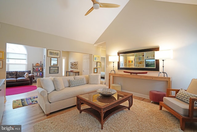 102 Morgan Way, Milton, DE 19968 - living room with high vaulted ceiling, wood finished floors, and a ceiling fan