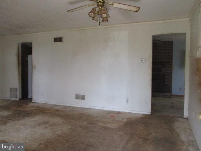 2014 Leland Ave, Baltimore, MD 21220 - spare room featuring carpet, a ceiling fan, and visible vents