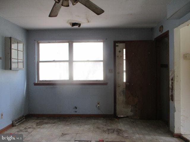 2014 Leland Ave, Baltimore, MD 21220 - empty room featuring baseboards and a ceiling fan