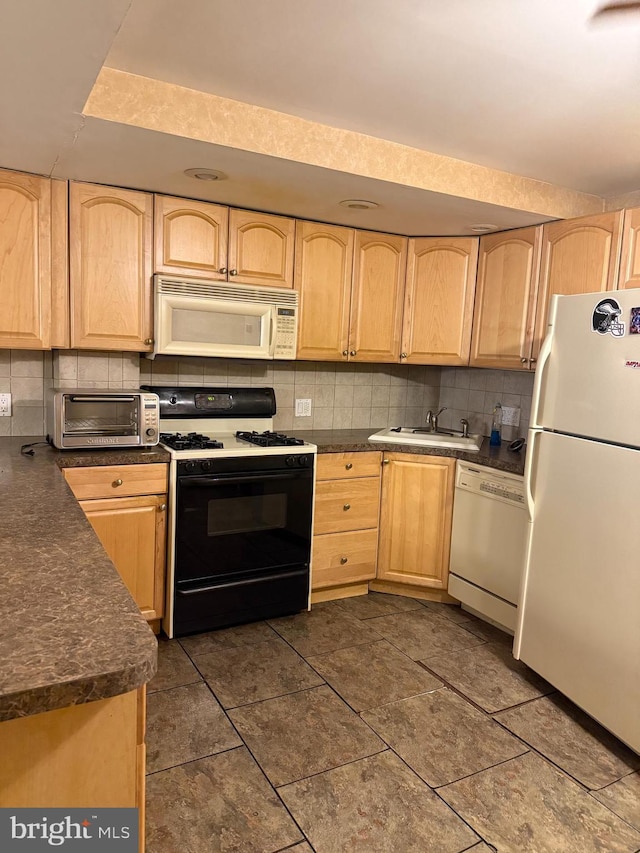 3017 S 17th St, Philadelphia, PA 19145 - kitchen featuring white appliances, light brown cabinetry, a sink, and tasteful backsplash