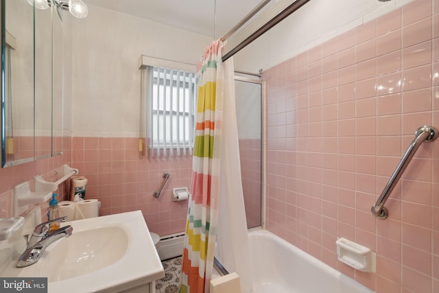 2341 S Hicks St, Philadelphia, PA 19145 - bathroom with vanity, tile walls, and shower / bath combo