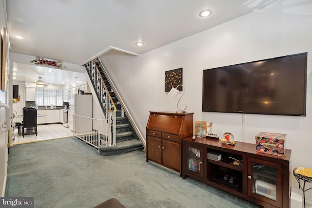 2341 S Hicks St, Philadelphia, PA 19145 - living area with recessed lighting, light carpet, and stairs