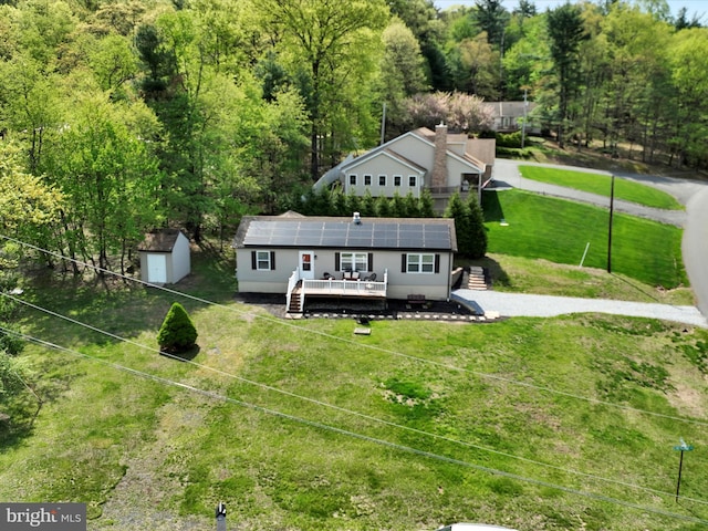 drone / aerial view with a forest view