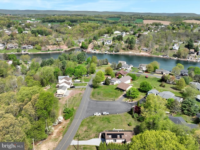 bird's eye view with a water view and a residential view