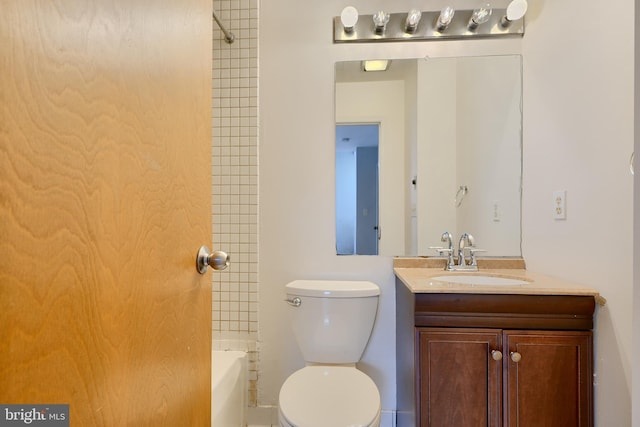 702 S Wolfe St Unit 5, Baltimore, MD 21231 - bathroom with toilet, vanity, and shower / washtub combination