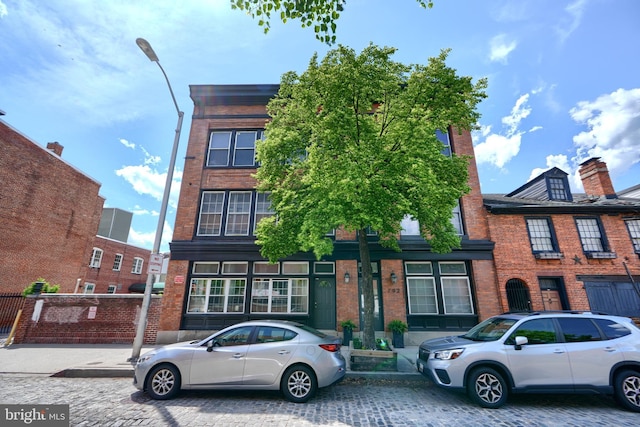 702 S Wolfe St Unit 5, Baltimore, MD 21231 - townhome / multi-family property featuring brick siding