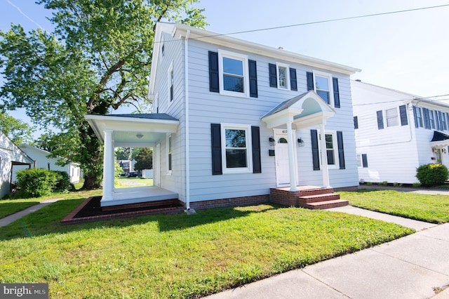view of front facade with a front yard