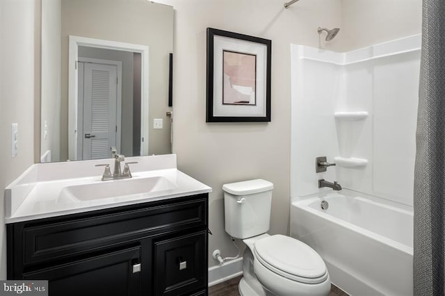 bathroom with vanity, shower / bathtub combination with curtain, and toilet