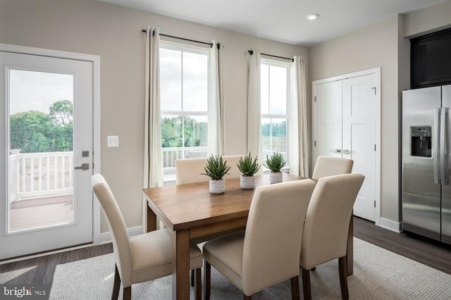 dining space with recessed lighting, baseboards, and dark wood-style flooring