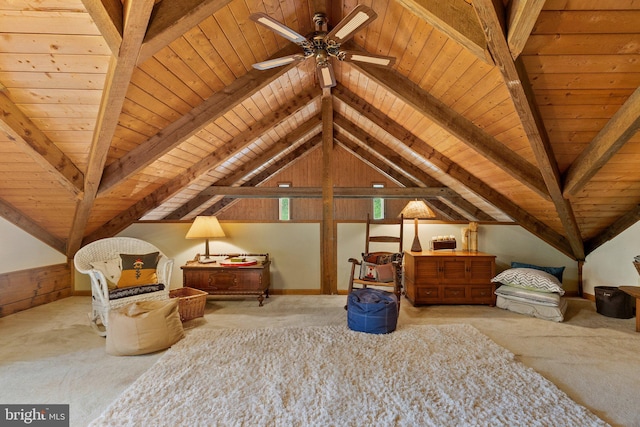 interior space featuring lofted ceiling with beams and wooden ceiling