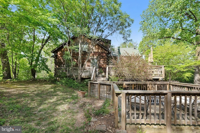 exterior space with a wooden deck