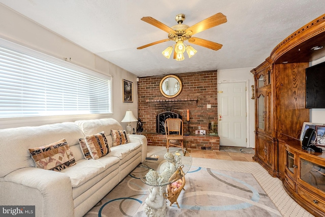7202 Good Luck Rd, Lanham, MD 20706 - living area featuring a ceiling fan, a fireplace, and light tile patterned flooring