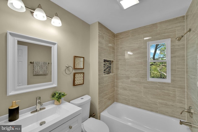 full bathroom featuring vanity, toilet, and tub / shower combination