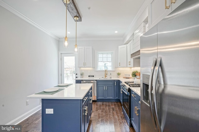 2326 Gerritt St, Philadelphia, PA 19146 - kitchen with backsplash, blue cabinets, a sink, light countertops, and stainless steel appliances