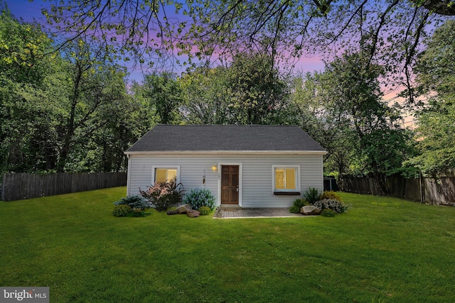 view of outdoor structure with a fenced backyard