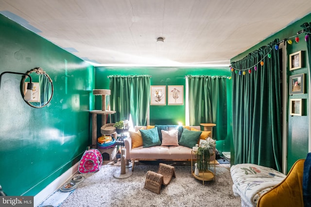 sitting room featuring baseboards