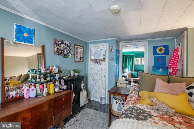 bedroom with crown molding
