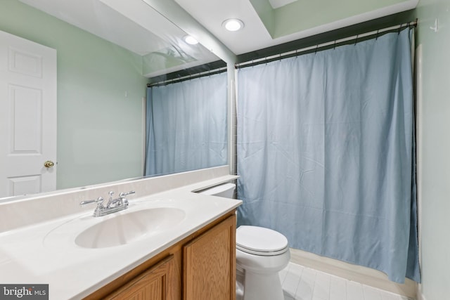 bathroom with recessed lighting, vanity, toilet, and a shower with shower curtain