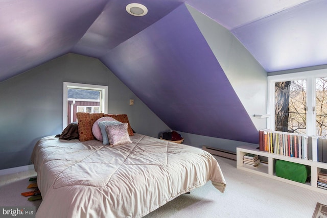 carpeted bedroom with a baseboard heating unit and lofted ceiling