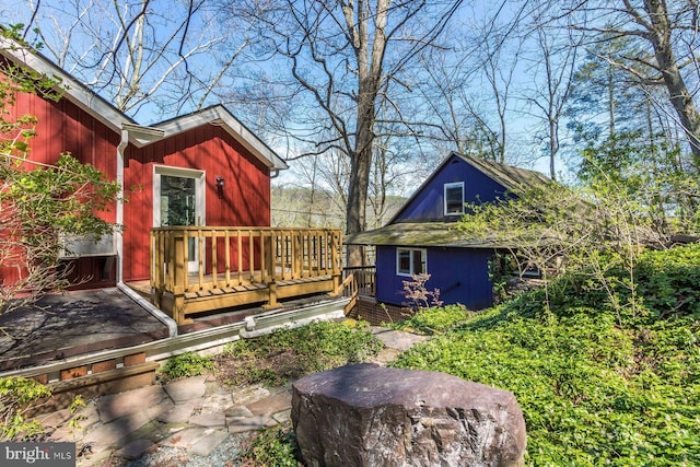 exterior space featuring a wooden deck