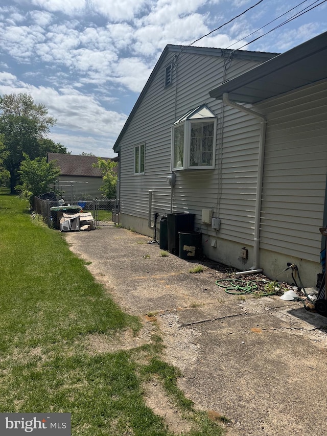 603 Leuckel Ave, Hamilton, NJ 08619 - view of home's exterior with a lawn, fence, and driveway