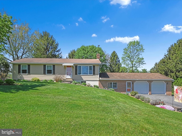 917 Houtztown Rd, Myerstown, PA 17067 - ranch-style home with an attached garage, driveway, a chimney, and a front yard