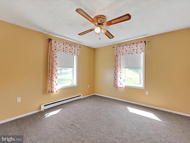 917 Houtztown Rd, Myerstown, PA 17067 - empty room with ceiling fan, a baseboard heating unit, a wealth of natural light, and carpet